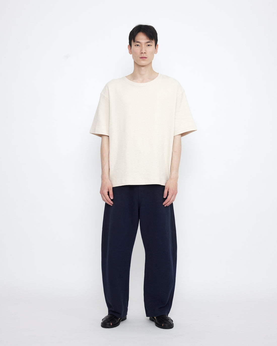 Relaxed Curve Legged Trouser - SS25 - Navy