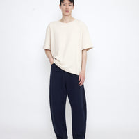 Relaxed Curve Legged Trouser - SS25 - Navy